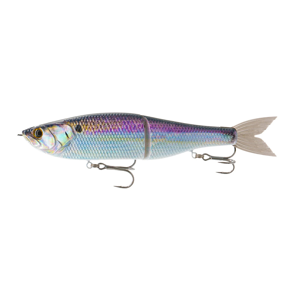 The 6th Sense Draw Glide Bait by 6th Sense mimics a small fish with shiny blue, purple, and silver scales, features two treble hooks below, and is finished with a translucent tail fin for lifelike appeal.