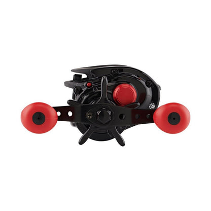 The Abu Garcia Max X Casting Reel 6.4:1 Left Hand (MAX4X-L) is shown from the front with two large red handles, a red adjustment knob, and features Duragear Brass gear for durability—all against a white background.