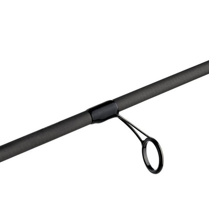 Close-up of a sleek, cylindrical segment from the Abu Garcia Zenon Spinning Rod 7'0" Medium Heavy | ZENS70-6, featuring a dark circular line guide. Positioned horizontally, it contrasts subtly with the matte finish, hinting at precision characteristic of the Zenon series by Abu Garcia.