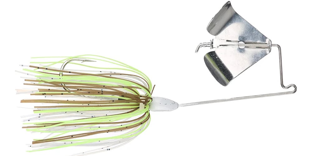 The Accent Jacob Wheeler Finesse Buzzbait by Accent features a metal blade, wire frame, and a skirt with green, white, and brown strands—perfect for attracting fish and ideal for dedicated anglers.