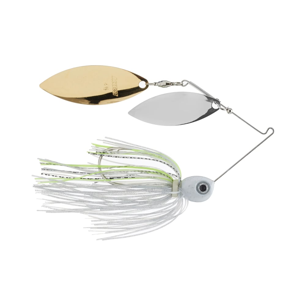 The Accent Jacob Wheeler Double Crossbone Spinnerbait features dual metallic blades—one gold, one silver—on a wire arm, with a gray fish-like head and visible eye. Its white and green skirt makes it ideal for experienced spinnerbait fishermen seeking inspiration from Accent's design.
