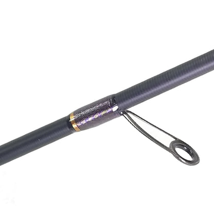 The ALX ENOX Spinning Rod Wizard 7'2" Medium | E28630FS boasts a black design with a textured grip and guide ring, ideal for finesse techniques. Its sleek dark finish and subtle reflective pattern near the fast tip make it perfect for precision fishing.