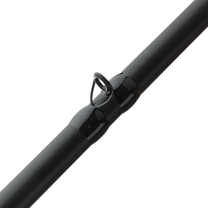 Close-up of the sleek ALX IKOS Casting Rod Buzz 7, showcasing a shiny metal guide ring. Its glossy surface highlights the 7'0" medium power, fast action IC84F3 design for precise casting.