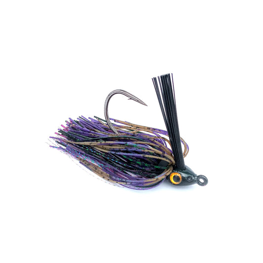 The Beast Coast Zero Flex Gorilla Swim Jig V1 7/16oz. Toxic Bug features a large hook, weed guard, purple, black, and brown skirt strands, and a head with a painted yellow eye, displayed on a white background.