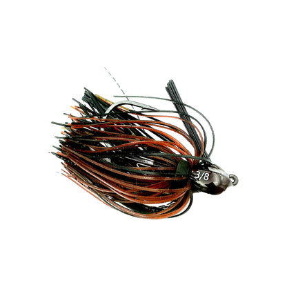 The Beast Coast Lil' Magnum Compact Flipping Tungsten Jig features mixed orange, brown, and black strands below a metal head marked "3/8" weight. Its weight-forward design efficiently attracts fish.