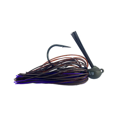 The Beast Coast Lil' Magnum Compact Flipping Tungsten Jig has a weight-forward design, expertly angled weed guard, and a round head marked "3/8." It features a black hook and multicolored silicone skirt strands in brown and purple.