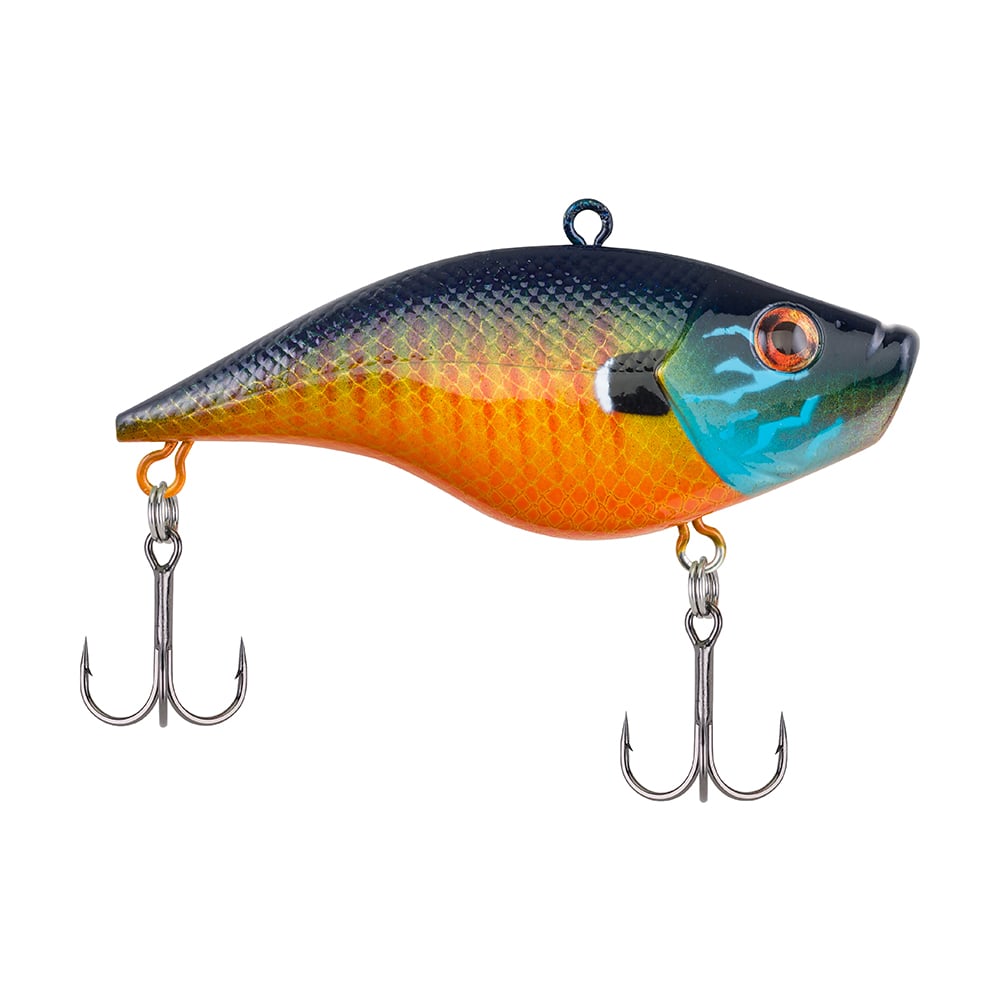 The Berkley Warpig Jr. Lipless Crankbait is a colorful, fish-like bait with blue, green, orange, and yellow scales. It features two treble hooks underneath and a top eyelet for line attachment, providing an aggressive glide in the water.