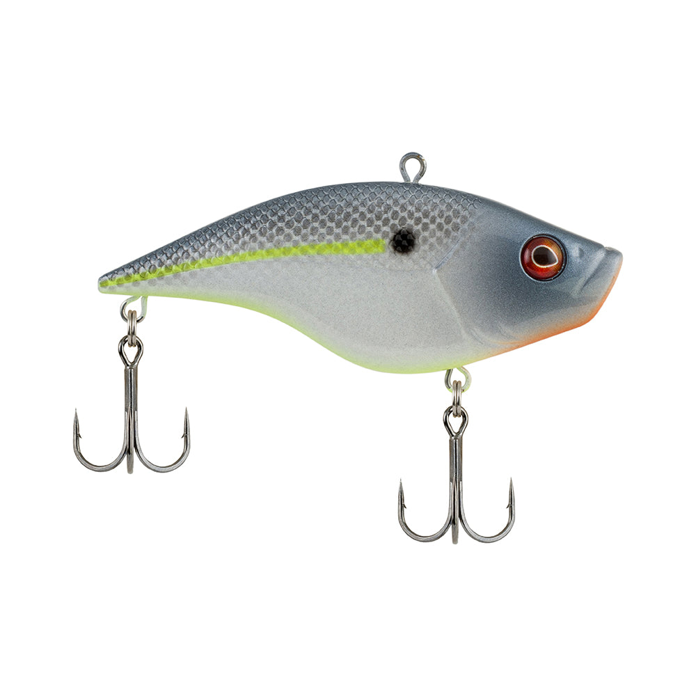 The Berkley Warpig Jr. Lipless Crankbait by Berkley features a gray and white body with subtle yellow accents, a red eye, and two metal treble hooks hanging below.