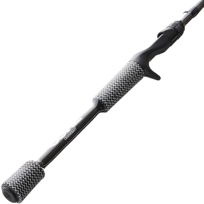 A close-up of the Cashion CORE Series Casting Rod Cranking 7'0" Medium Heavy (CC8457) handle by Cashion, featuring a textured gray and white grip and trigger-style reel seat, shown diagonally on a white background.