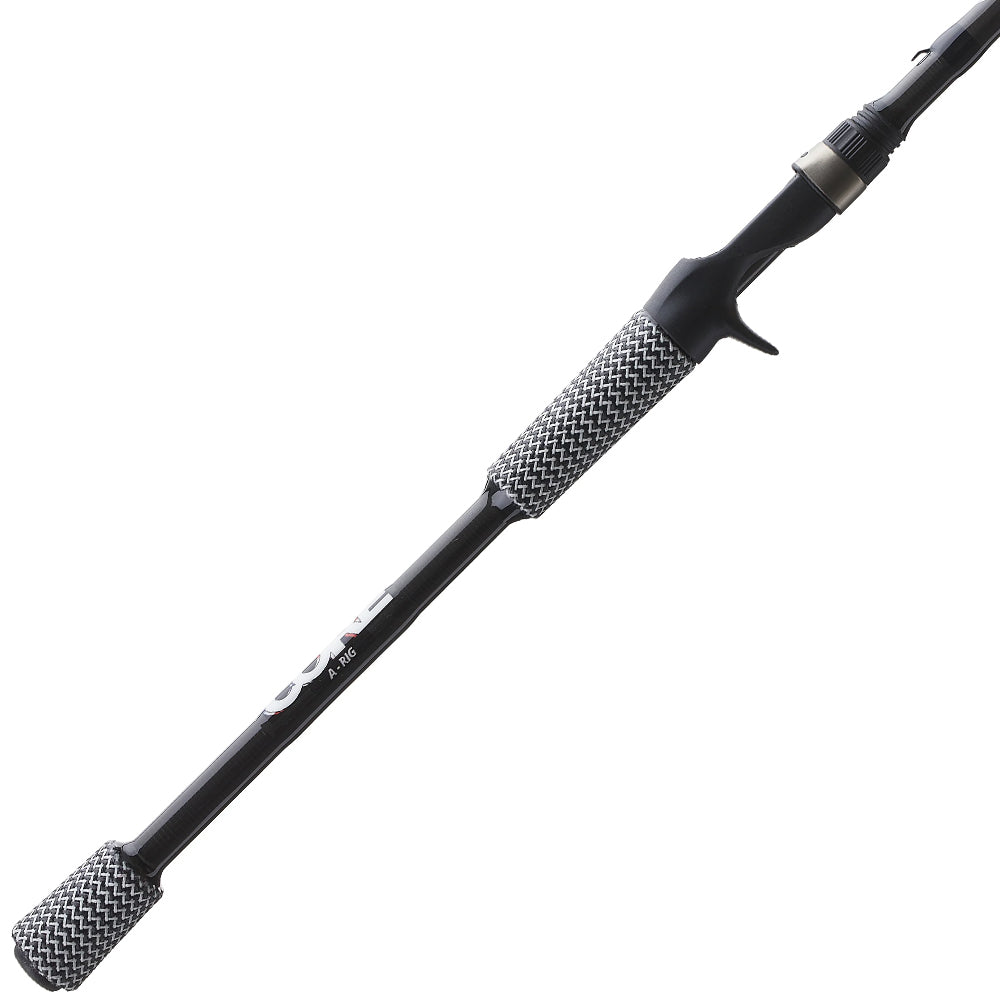 A close-up of the Cashion Rods CORE Series Casting Rod Umbrella Rig 7'10" Heavy (CS956710U) by Cashion highlights its black patterned grip, trigger-style reel seat, and modern design—perfect for throwing an Alabama rig.