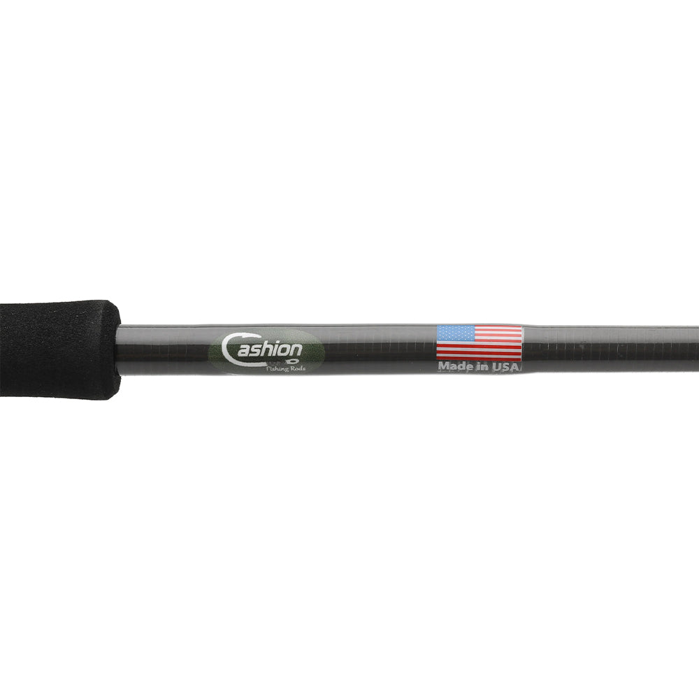 The Cashion Rods ICON Series Panfish Trout Spinning Rod 6'6" Ultra Light (IPT66ULFS) features a black carbon fiber rod with a foam handle, "Cashion" label, and USA flag graphic—ideal for panfish and trout.