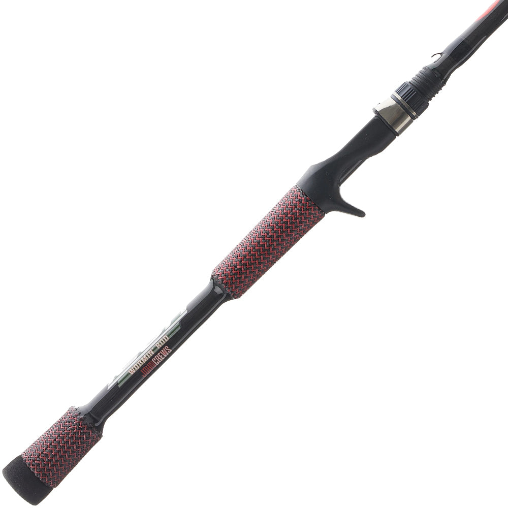 A close-up of a black Cashion John Crews ICON Series Casting Rod Worming 7'2" Medium Heavy with red and gray textured grips on the handle and butt, displayed on a white background.