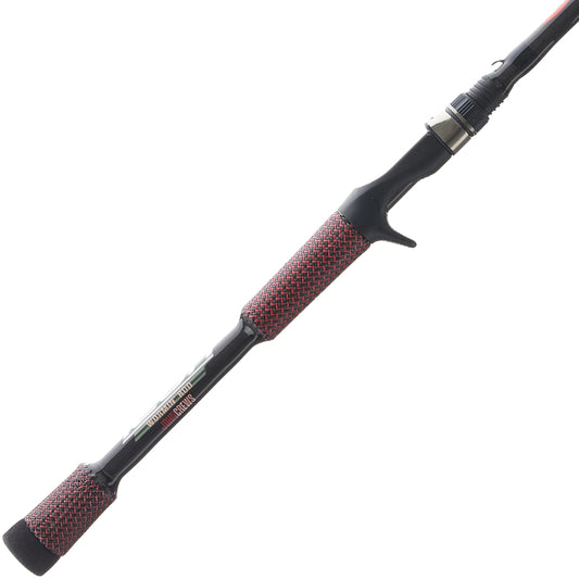 A close-up of a black Cashion John Crews ICON Series Casting Rod Worming 7'2" Medium Heavy with red and gray textured grips on the handle and butt, displayed on a white background.