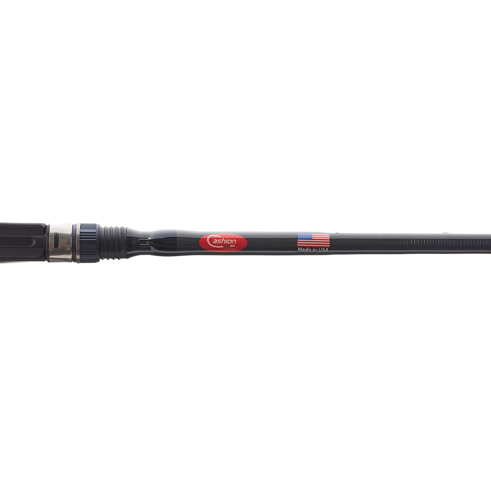 A close-up of a Cashion John Crews ICON Series Casting Rod Worming 7'2" Medium Heavy handle features the Cashion logo and an American flag with “Made in USA” text on the rod shaft.