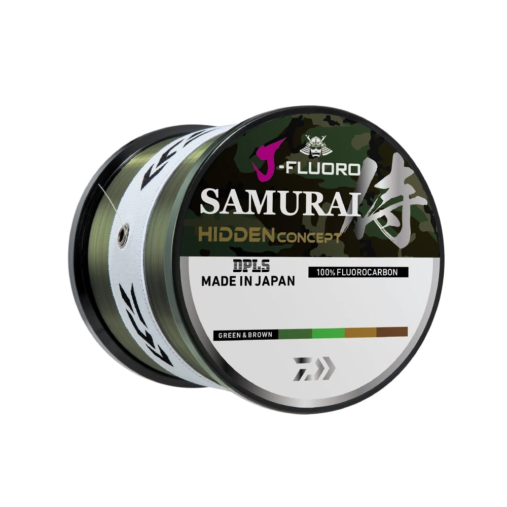 The Daiwa J Fluoro Samurai Hidden Concept 1000yd fishing line, made in Japan, features abrasion-resistant color blending technology and a camouflage design with Japanese characters on the packaging.