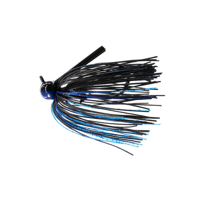 The Dirty Jigs Tour Level Skirted Football Jig features a round dark blue head, long black and blue silicone skirt strands to mimic bait, and a sharp Mustad ULTRA POINT hook—perfect for effective fish-catching action.