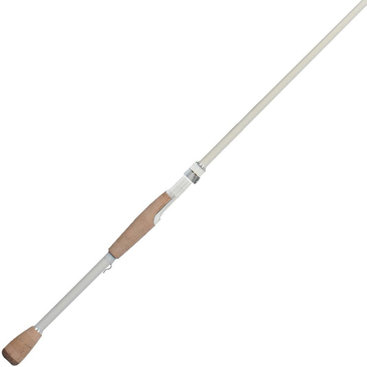 The Duckett Pro Series Spinning Rod Dean Rojas 6'9" Medium Heavy showcases a cork handle and white shaft, angled diagonally on a plain background. Equipped with Carbon Nano Technology and a metallic reel seat, it boasts a sleek, modern design.