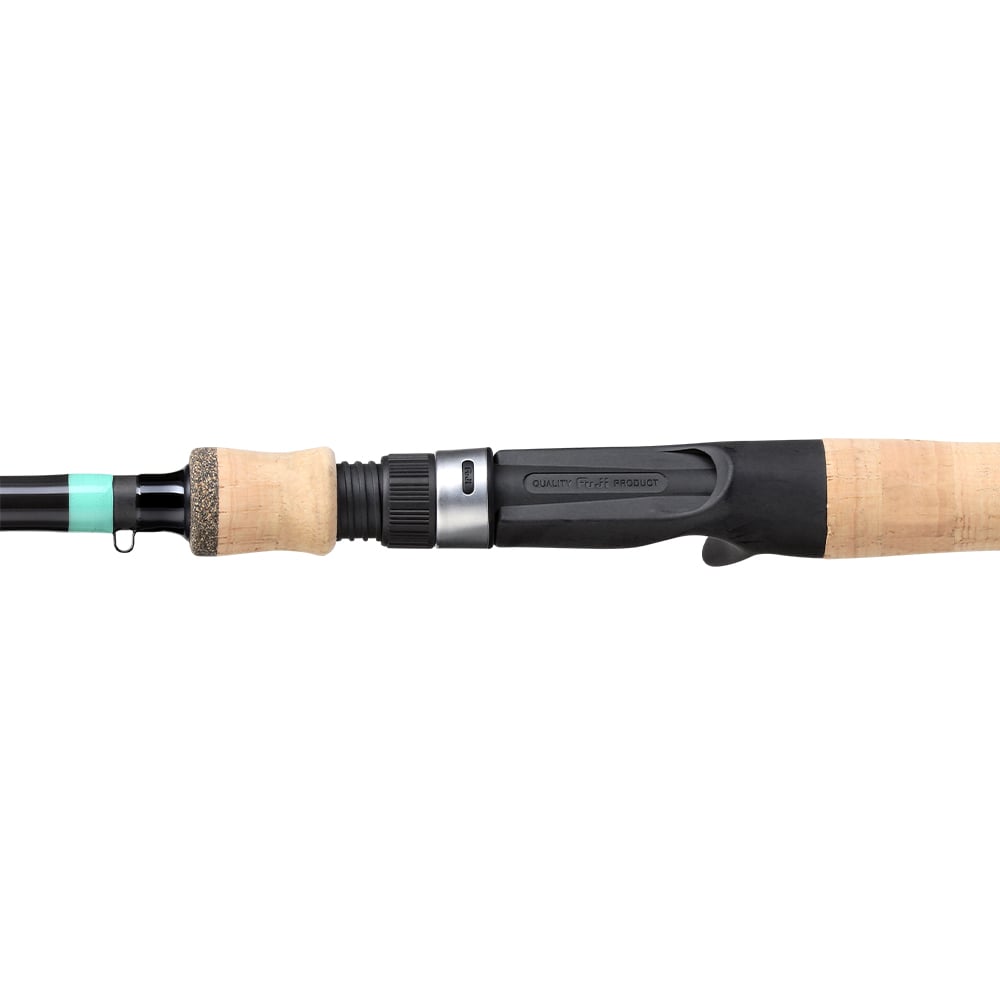 Close-up of the G. Loomis GCX Inshore Casting Rod 843C F 7'0" Medium Heavy handle featuring a cork grip, metal reel seat, and black trigger grip, designed for saltwater anglers—shown on a white background.