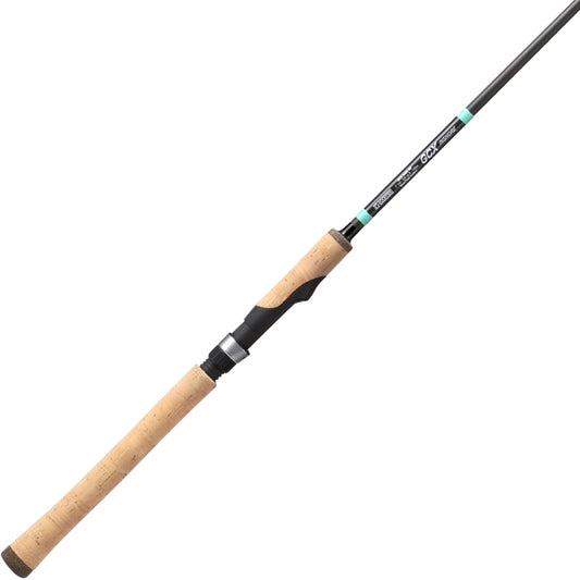The G. Loomis GCX Inshore Spinning Rod 964S MF 8’0” Heavy features a long, light brown cork handle, Fuji reel seat, slim dark graphite blank, and teal and silver accents for style.