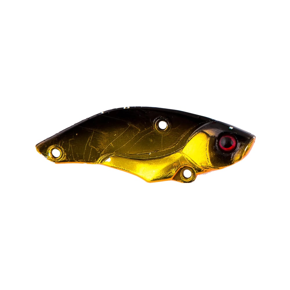 The Jackall Keeburn Blade Bait by Jackall is a fish-shaped metallic lure with a dark brown and gold body, three small holes on top, and a red-rimmed eye.