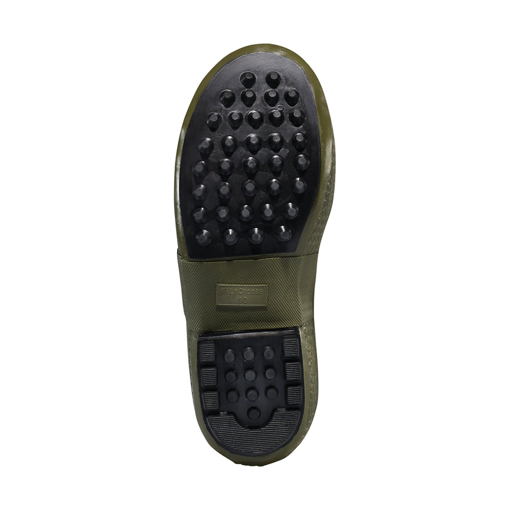 The image shows the bottom of an olive green Lacrosse Burly Rubber Boots Foam Insulated 18" with a black sole, round traction studs, and a rectangular heel grip section for waterproof protection.