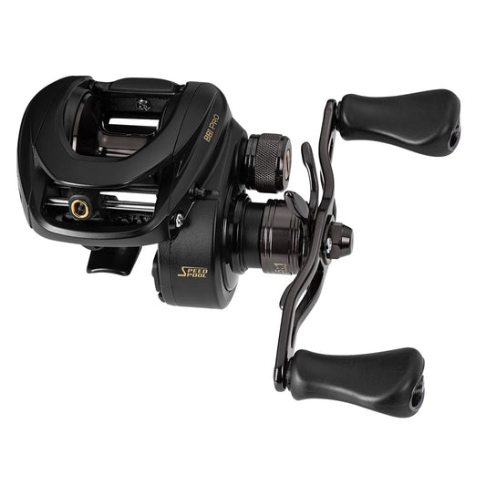 The Lew's BB1 Pro Casting Reel 6.2:1 Left Hand (PRO1HL) features a black, compact design with dual handles, textured grips, gold accents, adjustment knobs, and an adjustable centrifugal braking system.
