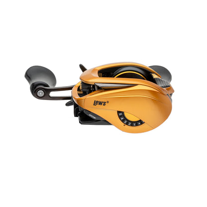 A Lew's Custom Pro Gen 3 Casting Reel 7.5:1 RH (CPB1SHG3) in gold, featuring a side-mounted tension adjustment dial, two black handles, and Inertia Transfer Braking, displayed against a white background.