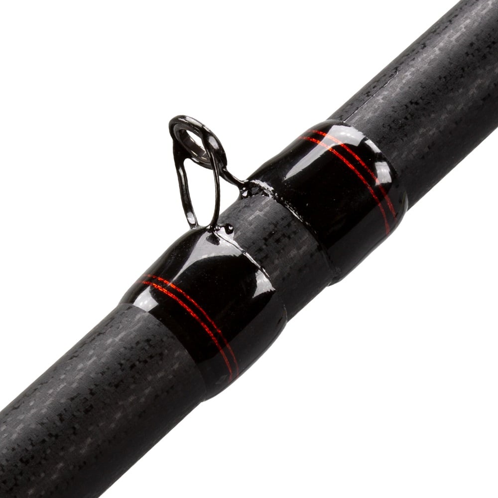 Close-up of a Lew's KVD Series Graphite Casting Rod 7'0" Medium All Purpose Reaction with black finish, red accents, and a metal guide ring secured by glossy black thread wrapping.