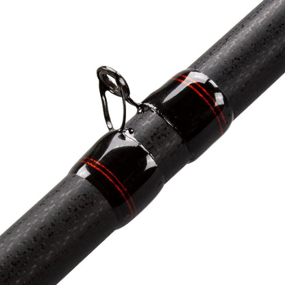 Close-up of the Lew's KVD Series Graphite Casting Rod, featuring a black carbon fiber finish and sleek red accents. This 7'10" Heavy Flipping/Pitching rod (LKVDGC10) showcases superior design and performance.
