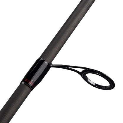 Close-up of the Lew's KVD Series Graphite Spinning Rod 7'2" Medium Shakey Head/Tube (LKVDGS5), featuring a black guide ring attached to its dark, textured graphite shaft, shown on a white background.