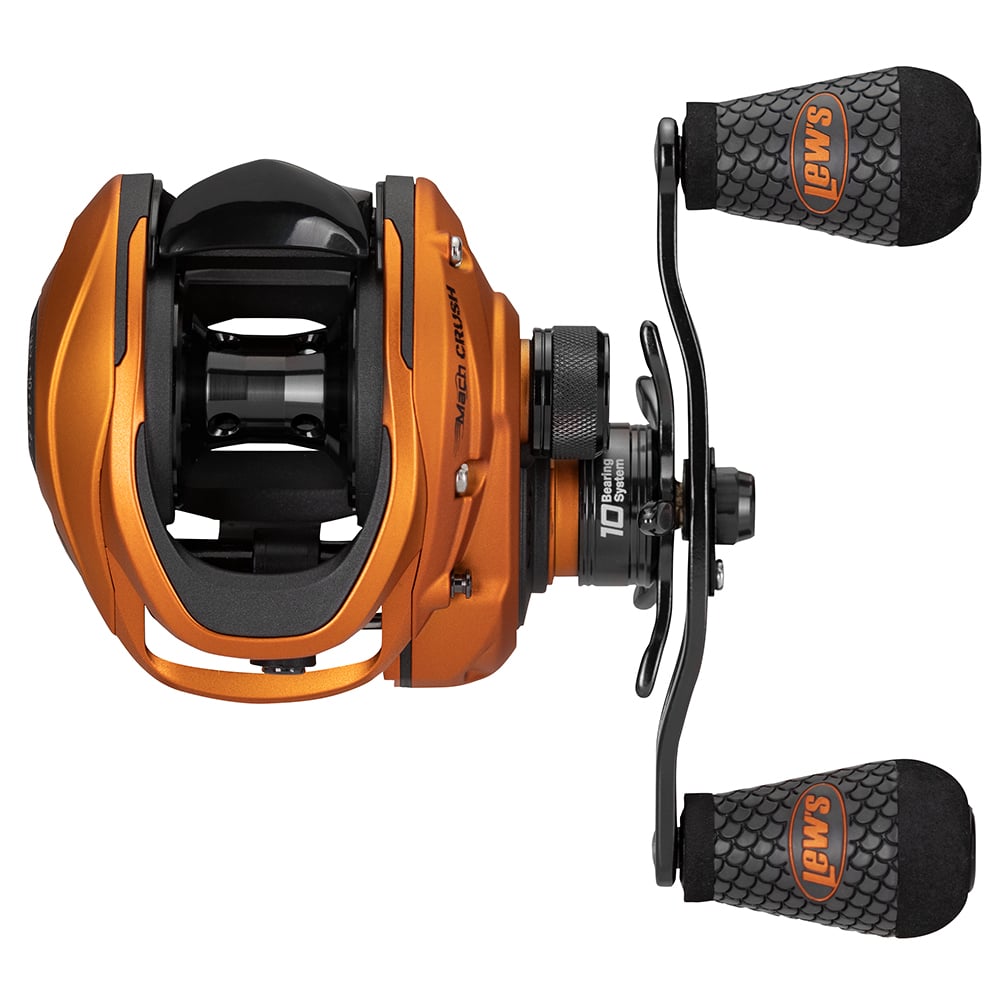 Top view of Lew's Mach Crush SLP Series Casting Reel 7.5:1 Left Hand (MCR1SHLA) in orange, with two black textured "SMAI" handles, black adjustment knobs, and visible inner spool.