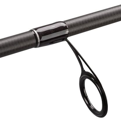 Close-up of a Lew's Team Lew's Signature Series Spinning Rod 7'2" Medium (TLS72MXFS) guide, showcasing the circular loop, FOCAS Blank technology, and a textured surface with glossy black thread wraps.