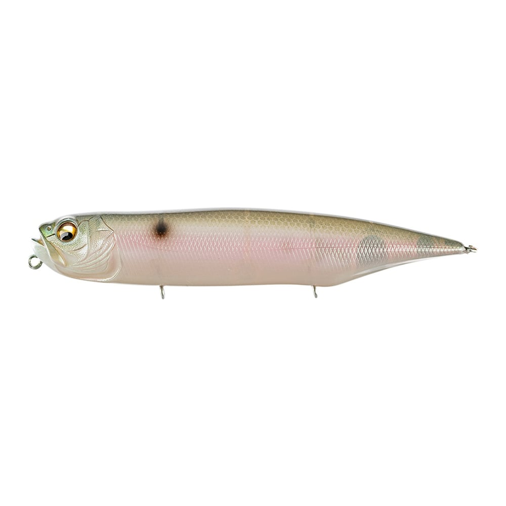 The Megabass Dog-X Diamante Rattle is a lifelike, fish-shaped topwater lure with a green back, pink sides, a shiny silver-white belly, oversized eye, two underside hooks, and realistic walking action.