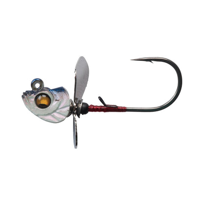 The Megabass Okashira Screwhead features a fish-shaped metallic body, large yellow eye, asymmetrical propeller under the head, and a single curved hook for enhanced penetration.