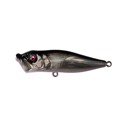 The Megabass Pop-X fishing lure by Megabass features a fish-like design with a shiny, dark metallic body, textured scales, patented gill system, large red eye, and metal rings for attaching the fishing line.