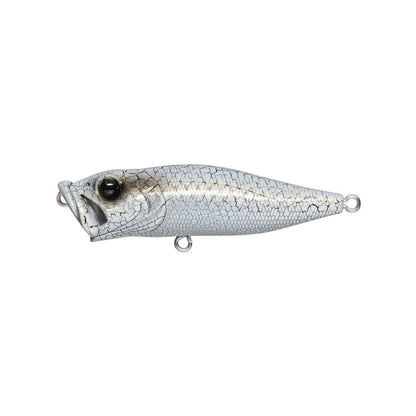 A close-up of a Megabass Pop-X, a fishing lure by Megabass. It mimics a fish with its light gray, scale-like texture and large black eye, equipped with metallic loops for line attachment.