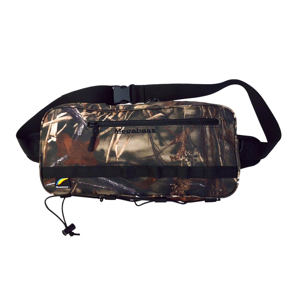 Introducing the Megabass Rapid Bag Real Camo, an ideal waist bag for shore fishing. It features a black adjustable strap, large capacity, prominent zipper, multiple compartments, and a small logo patch on the bottom left corner for style.