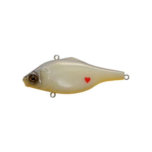 A white, fish-shaped Megabass Vibration-X Ultra (Rattle) lure by Megabass, featuring a realistic eye, internal balancers, and a small red heart on its side, shown isolated on a white background.