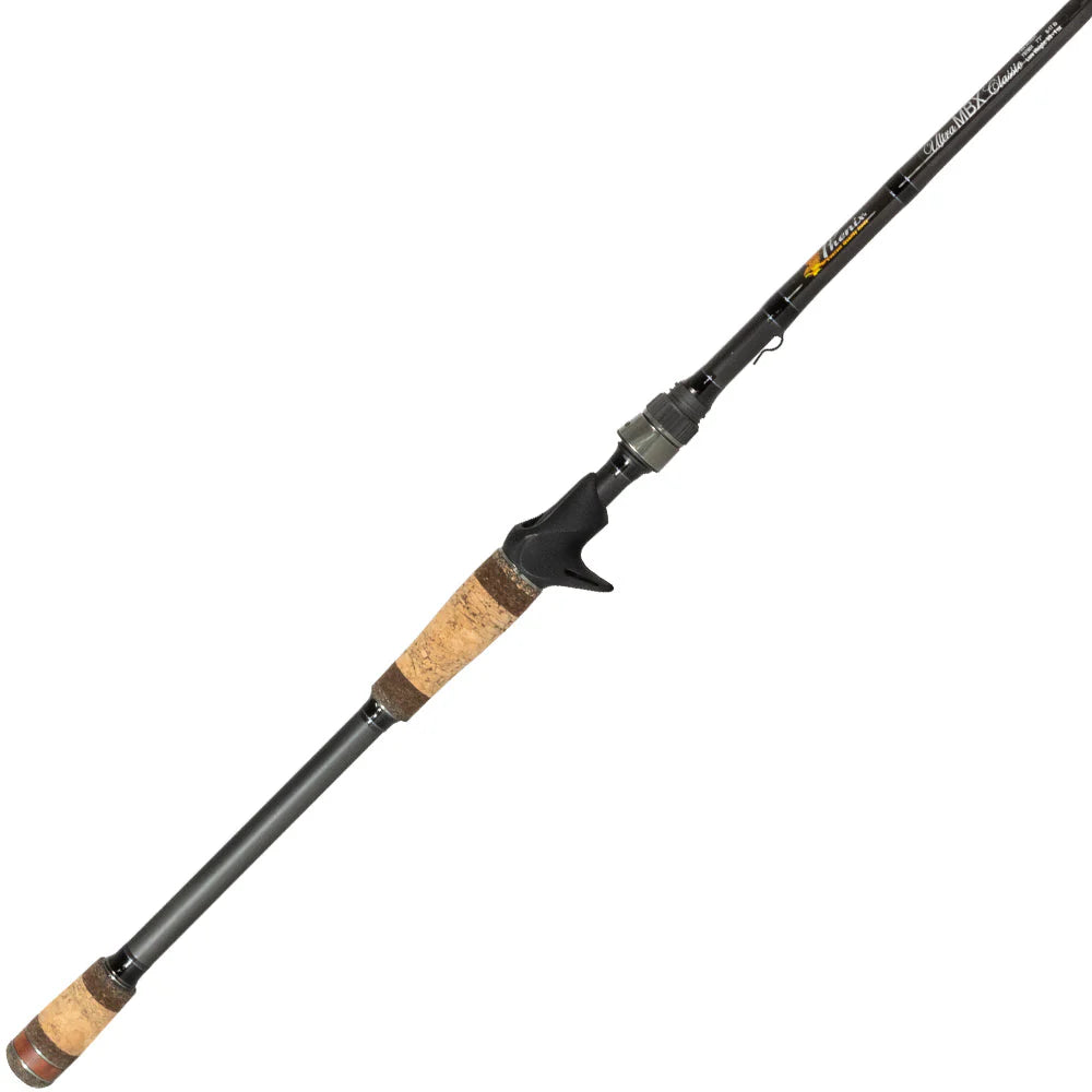 The Phenix Ultra MBX Casting Rod 7'3" Extra Heavy (PHX-UMBXCL-C703XH), made from Toray T40 Carbon Fiber with a cork handle and trigger grip, is shown upright on a white background.