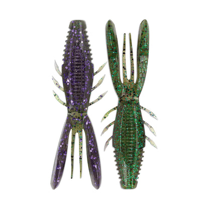 The Rapala Crush City Bronco Bug soft plastic lures are shaped like crawfish. The left lure is purple with glitter, featuring double-sided ribs, while the green one sparkles. Both have segmented bodies, hinged arms as pincers, and multiple appendages for realistic movement.