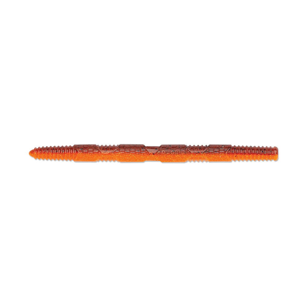 Close-up of a segmented, cylindrical object with a ridged texture and brownish-orange hue, resembling the body of a Rapala Crush City Pigstick.