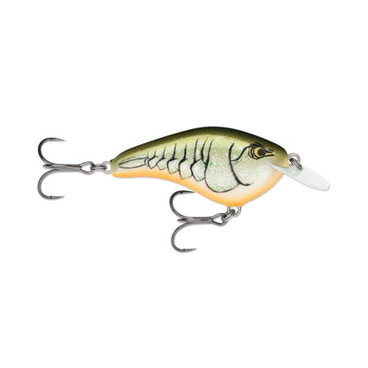 The Rapala OG Slim 6 Crankbait by Rapala is a painted lure inspired by classic balsa crankbaits, with a green back, pale belly, segmented scale pattern, two treble hooks, and a plastic front lip for bass fishing.