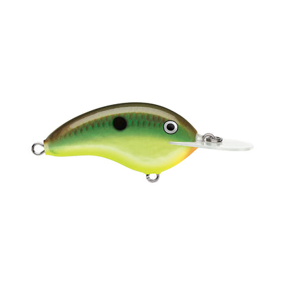 The Rapala OG Deep Tiny 7 Crankbait, by Rapala, features a green, yellow, and brown fish-like body with a black spot, large silver eye, and clear plastic lip for a tight wobble action.