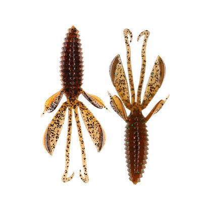 Two Reaction Innovations Kinky Beaver bait lures in brown and black speckles, designed for bass fishing, are displayed against a white background. They resemble aquatic creatures with segmented bodies, multiple appendages, flippers, and curly tails.