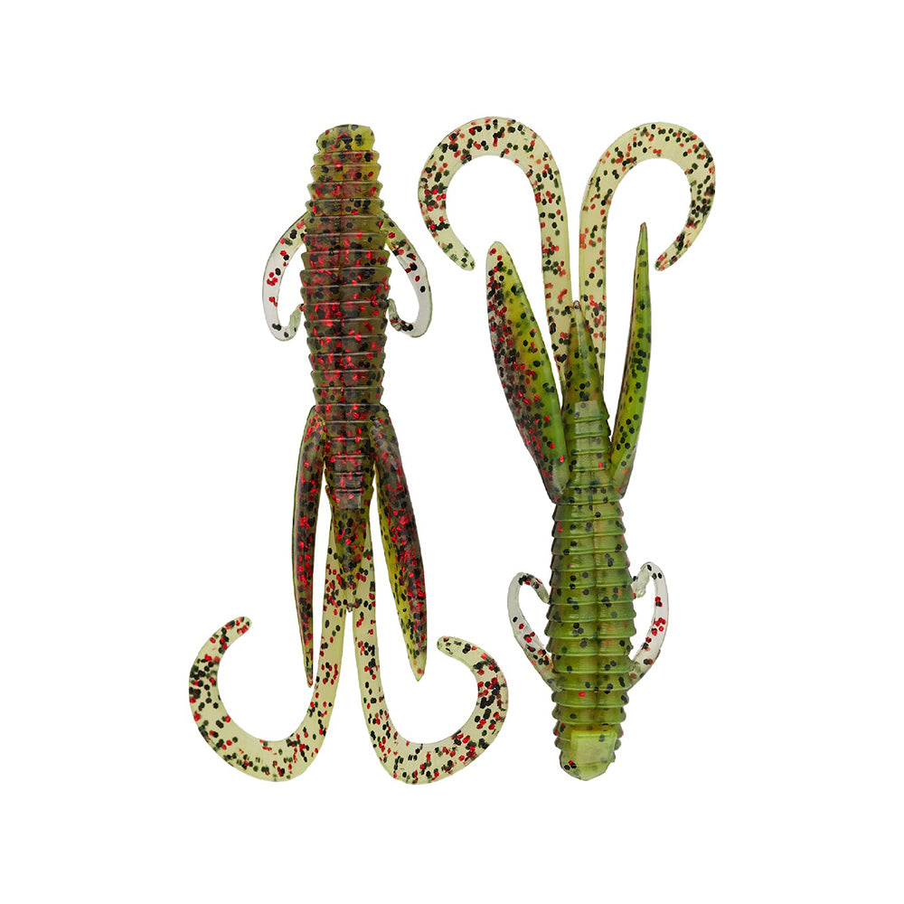 Two green Reaction Innovations Man Bear Pig creature baits, featuring ribbed bodies, curly tails, and red/black speckles, are shown side by side on a white background—one displays the top view for Flipping; the other shows the underside.