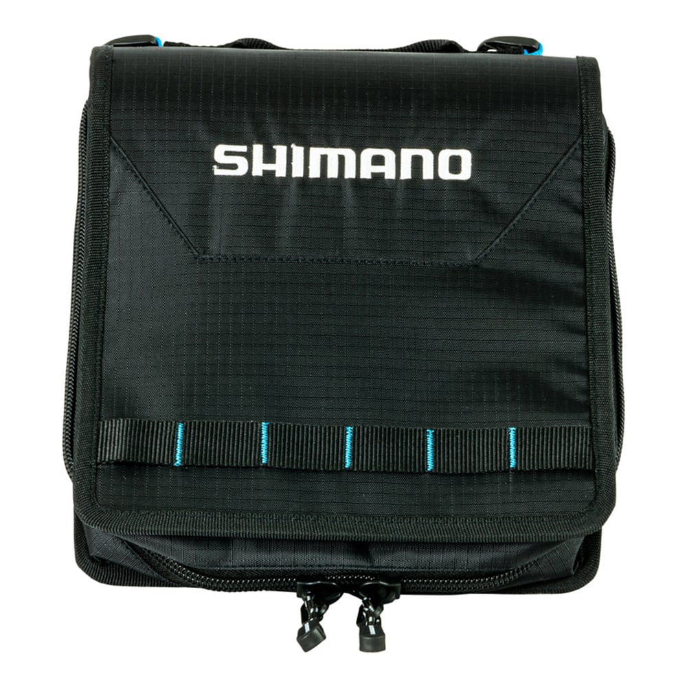 The Shimano Baraja Worm Binders by Shimano is a black carrying case with blue stitching, a white logo, flap closure, zipper pulls, and front webbing loops—perfect for organizing fishing tackle or soft plastics.