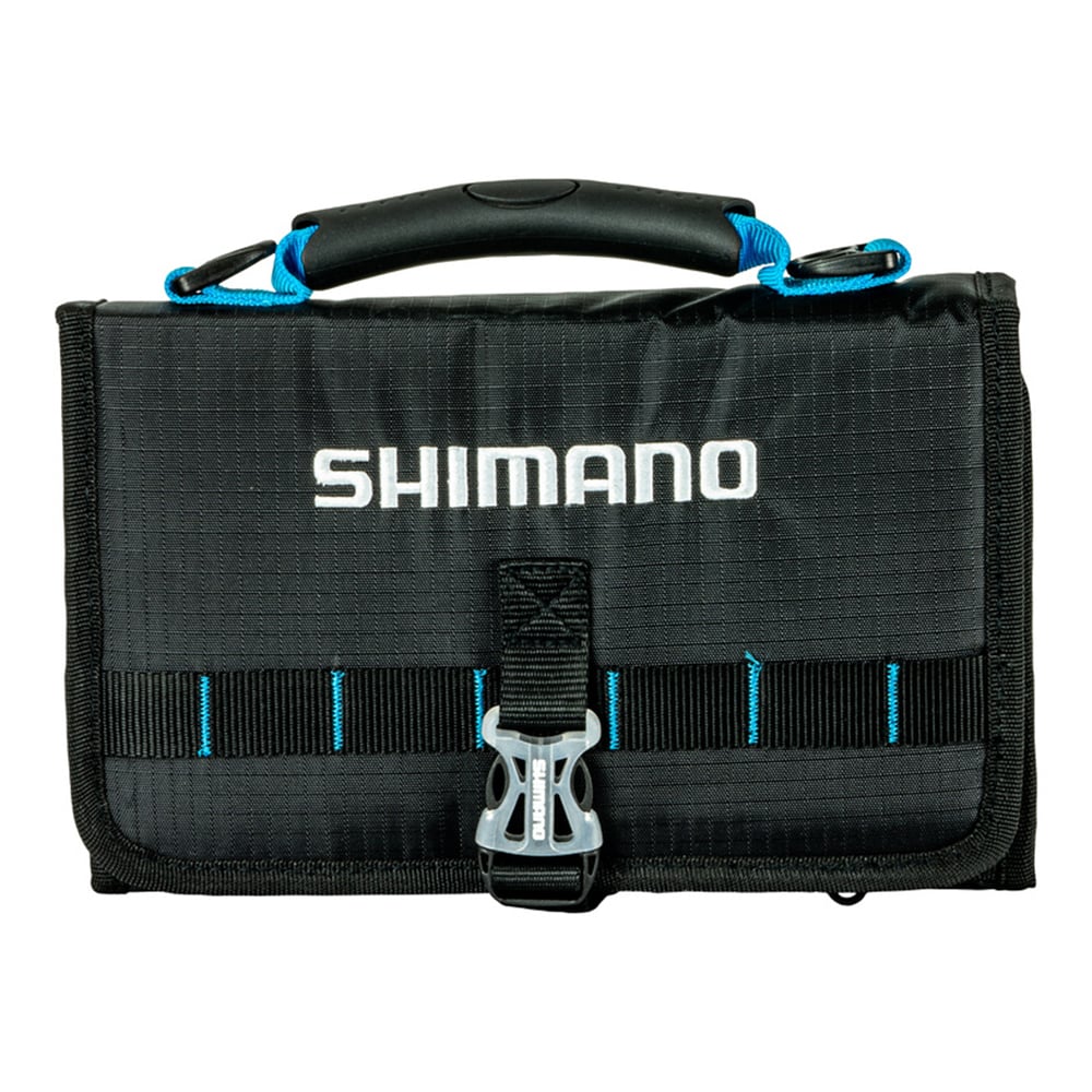 The Shimano Butterfly Jig Bags by Shimano are black storage bags with blue accents, a handle, front buckle closure, and visible stitching—ideal for keeping your jigs organized during offshore fishing trips.