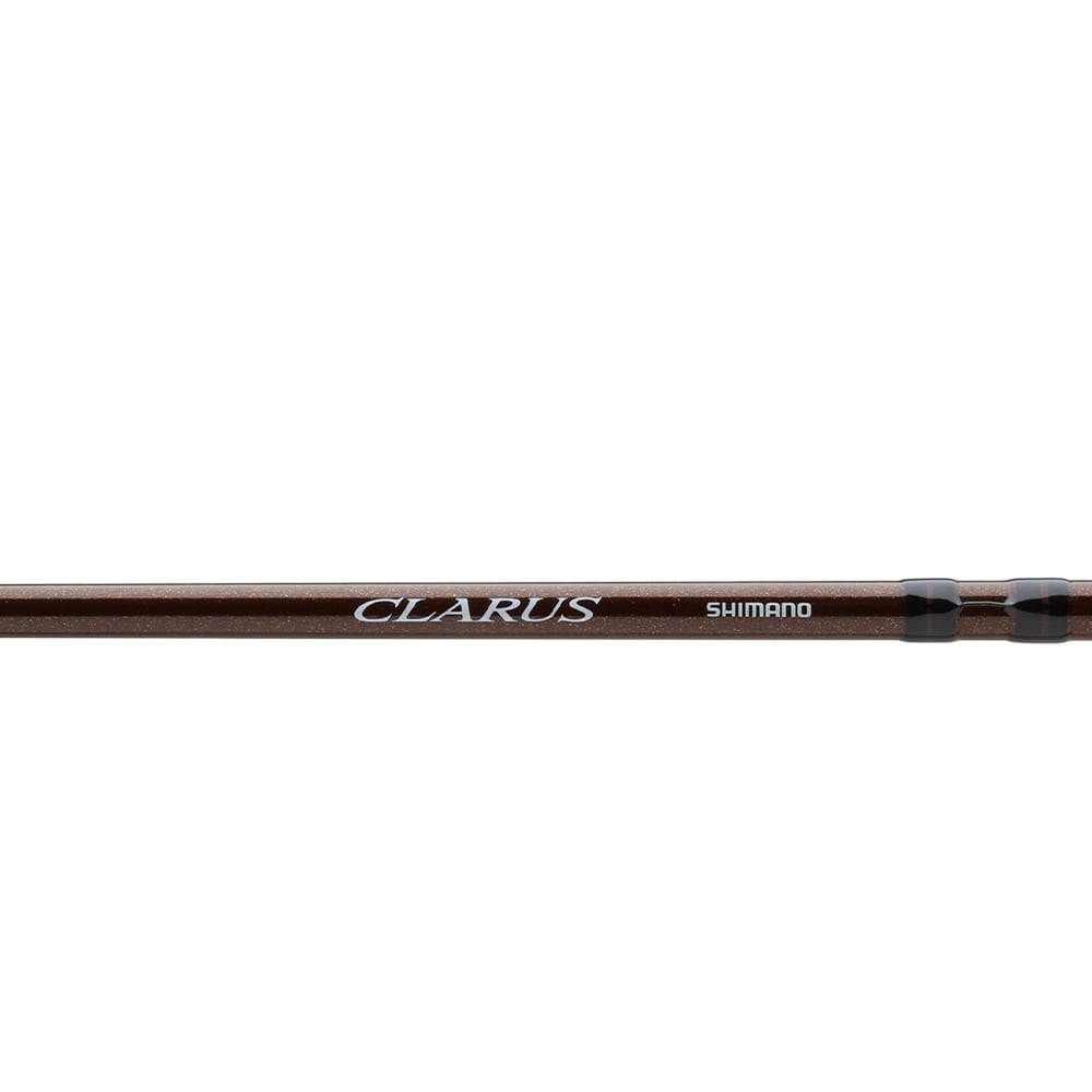 A close-up of the Shimano Clarus F Casting Rod 7'0" Medium Heavy 2 Piece (CSC70MH2F) shows "CLARUS" in white and "SHIMANO" near the handle. The rod has a metallic finish and black accents—ideal for versatile, multi-species anglers.