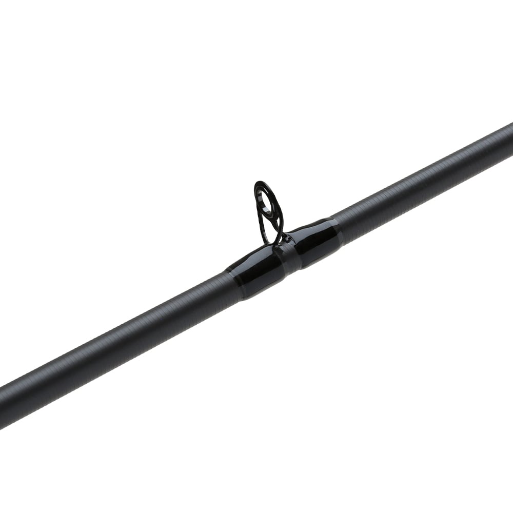 A close-up of the Shimano Clarus F Casting Rod 7'0" Medium Heavy 2 Piece (CSC70MH2F) by Shimano, highlighting a line guide and its sleek design against a white background—ideal for versatile, multi-species anglers.