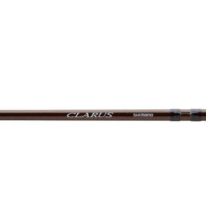 A close-up of the Shimano Clarus F Spinning Rod 7'0" Ultra Light shows its "CLARUS" and "SHIMANO" branding in white lettering on the brown shaft, emphasizing its distinct design and brand quality.